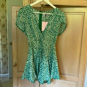 Romper, green and white.